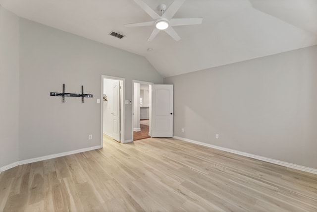 2600 Shiloh Rd, Denton, TX 76210 - unfurnished bedroom with lofted ceiling, light wood-type flooring, ensuite bath, and a ceiling fan