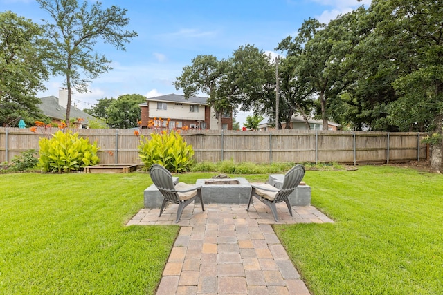 2600 Shiloh Rd, Denton, TX 76210 - fenced backyard with a fire pit and a patio