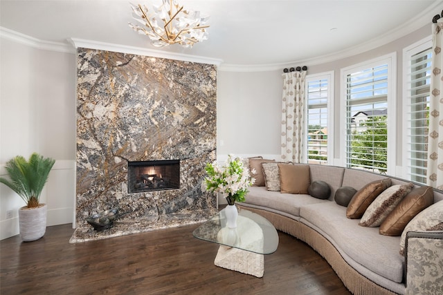 5302 Westfield Dr, Parker, TX 75002 - living area featuring ornamental molding, a premium fireplace, wood finished floors, and a chandelier