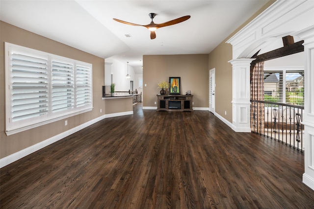 5302 Westfield Dr, Parker, TX 75002 - unfurnished living room featuring ceiling fan, dark wood-type flooring, and decorative columns