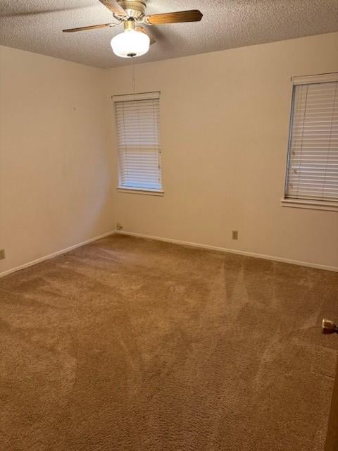 2329 Diana Dr, Sherman, TX 75092 - spare room with ceiling fan, a textured ceiling, and carpet floors