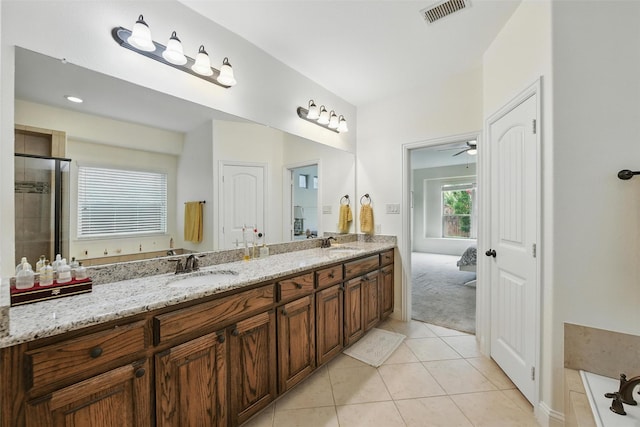1517 Presley Way, Argyle, TX 76226 - bathroom with double vanity, tile patterned floors, a bath, a tile shower, and ceiling fan