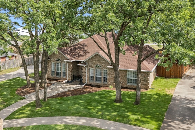 3108 Deerfield Dr, Denton, TX 76208 - view of front of property featuring a shingled roof and brick siding