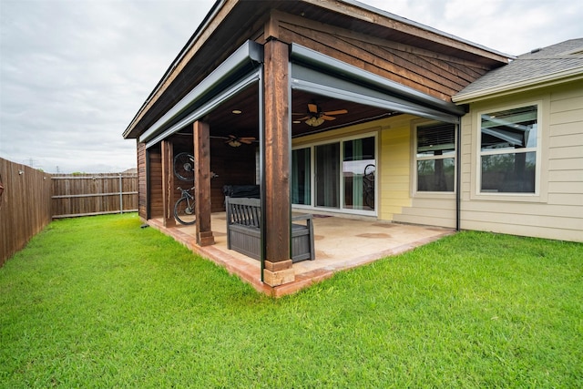 9200 S Field Ln, Arlington, TX 76002 - back of house with a ceiling fan, a fenced backyard, a patio, and a shingled roof