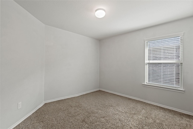 2300 Torch Lake Dr, Forney, TX 75126 - carpeted empty room with baseboards