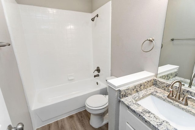 1449 Saint Gallen Ln, Lewisville, TX 75067 - bathroom featuring wood finished floors, bathtub / shower combination, and vanity