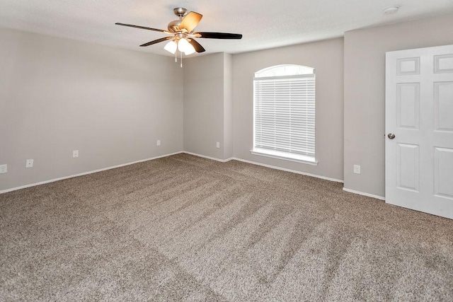 1449 Saint Gallen Ln, Lewisville, TX 75067 - empty room featuring ceiling fan, carpet flooring, and a smoke detector