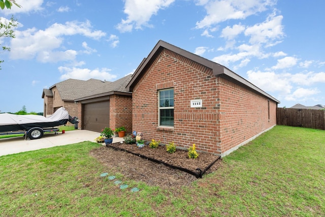 1112 Quaint Mdw, Princeton, TX 75407 - view of front of house featuring brick siding, concrete driveway, and an attached garage
