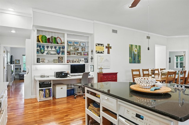 2116 Darby Dan Ct, Granbury, TX 76049 - kitchen featuring ornamental molding, light wood-type flooring, plenty of natural light, a ceiling fan, and white cabinets