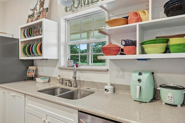 2116 Darby Dan Ct, Granbury, TX 76049 - kitchen featuring open shelves and white cabinets