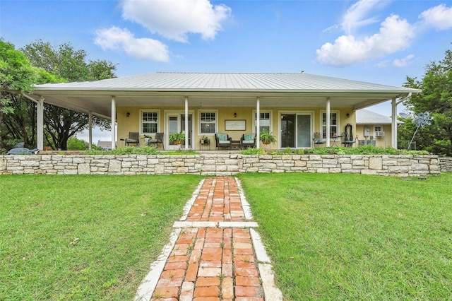 2116 Darby Dan Ct, Granbury, TX 76049 - view of front of house with a front yard, stucco siding, a metal roof, and covered porch