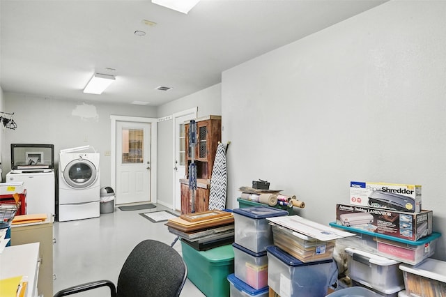 2116 Darby Dan Ct, Granbury, TX 76049 - miscellaneous room with separate washer and dryer and concrete flooring