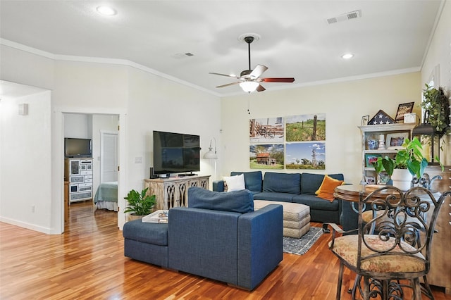 2116 Darby Dan Ct, Granbury, TX 76049 - living room with wood finished floors, ceiling fan, crown molding, and recessed lighting