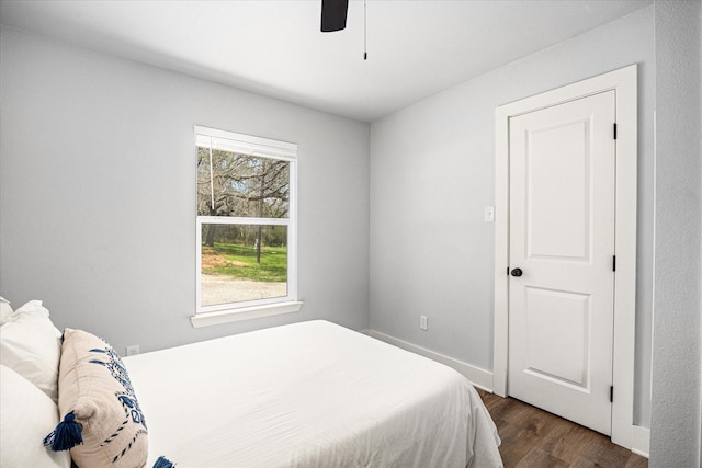 5986 Field Ct, Granbury, TX 76048 - bedroom with dark wood-style flooring and a ceiling fan