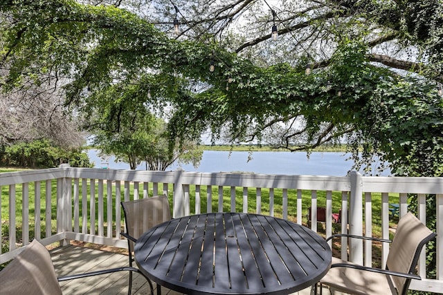 5986 Field Ct, Granbury, TX 76048 - deck featuring outdoor dining space, a water view, and a yard