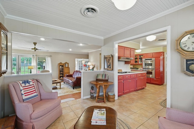 1615 Lopo Rd, Flower Mound, TX 75028 - living room with light tile patterned floors, ornamental molding, and ceiling fan