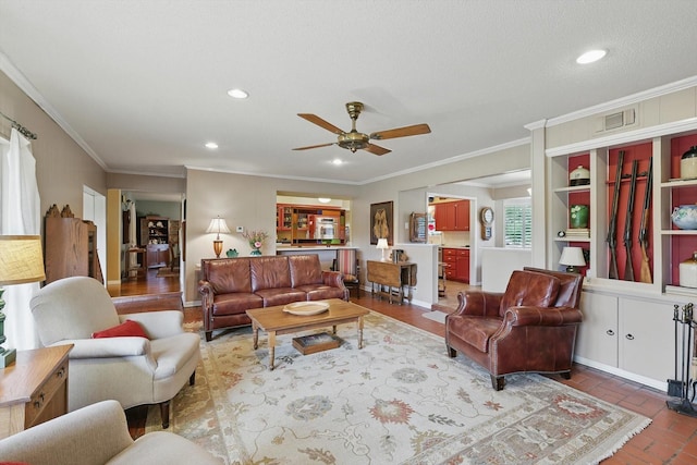 1615 Lopo Rd, Flower Mound, TX 75028 - living area with a ceiling fan, crown molding, brick floors, and recessed lighting