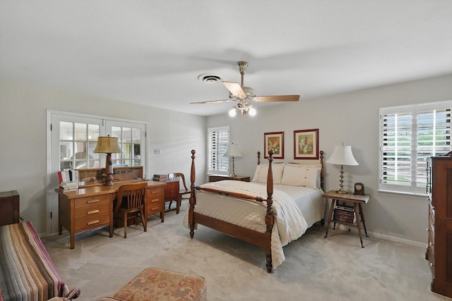 1615 Lopo Rd, Flower Mound, TX 75028 - bedroom with multiple windows, light colored carpet, and ceiling fan
