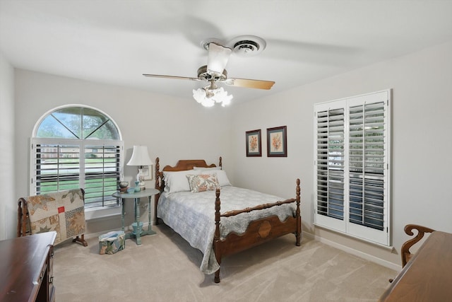 1615 Lopo Rd, Flower Mound, TX 75028 - carpeted bedroom with ceiling fan and baseboards