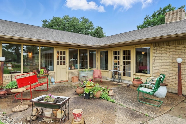 1615 Lopo Rd, Flower Mound, TX 75028 - view of patio featuring french doors