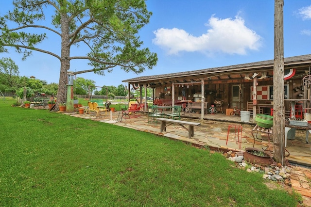 1615 Lopo Rd, Flower Mound, TX 75028 - view of grassy yard with a patio area