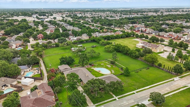 1615 Lopo Rd, Flower Mound, TX 75028 - aerial perspective of suburban area featuring a pool area