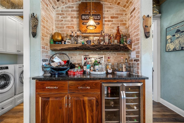 8029 N River Xing, China Spring, TX 76633 - indoor dry bar with beverage cooler, separate washer and dryer, dark wood finished floors, and brick wall