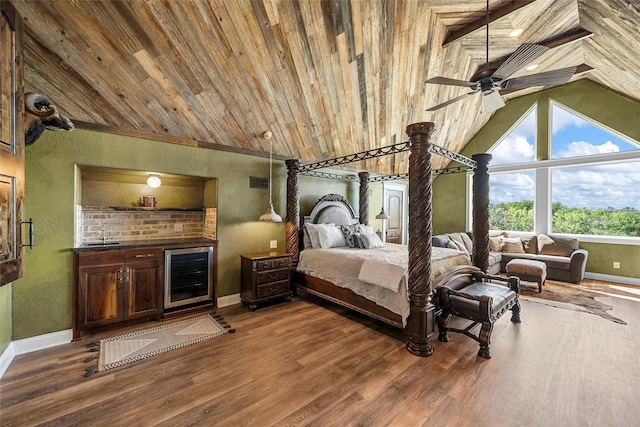 8029 N River Xing, China Spring, TX 76633 - bedroom featuring wine cooler, wooden ceiling, lofted ceiling, wood finished floors, and a textured wall