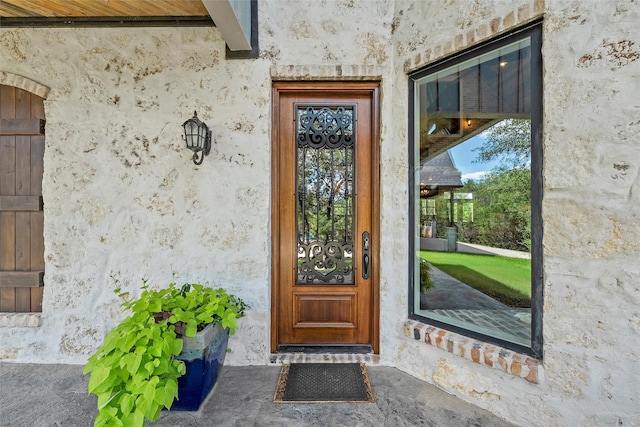 8029 N River Xing, China Spring, TX 76633 - view of exterior entry featuring stucco siding