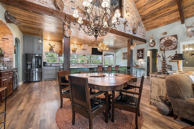 8029 N River Xing, China Spring, TX 76633 - dining space featuring arched walkways, wooden ceiling, a chandelier, wood finished floors, and high vaulted ceiling