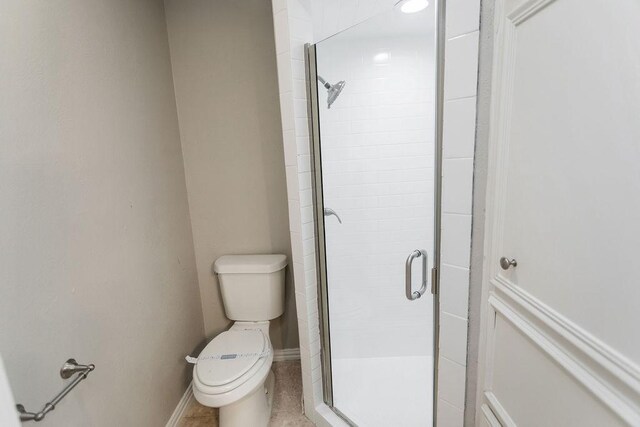 6908 Briardale Dr, North Richland Hills, TX 76182 - bathroom featuring a shower stall and toilet