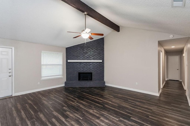 6908 Briardale Dr, North Richland Hills, TX 76182 - unfurnished living room featuring a ceiling fan, wood finished floors, a brick fireplace, and a textured ceiling