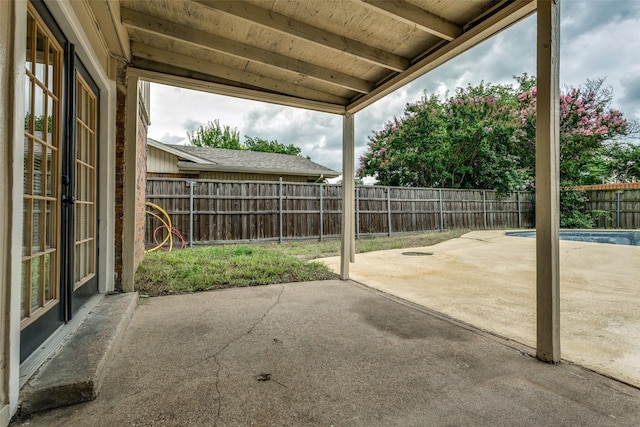 2018 Vail Dr, Garland, TX 75044 - fenced backyard with a patio