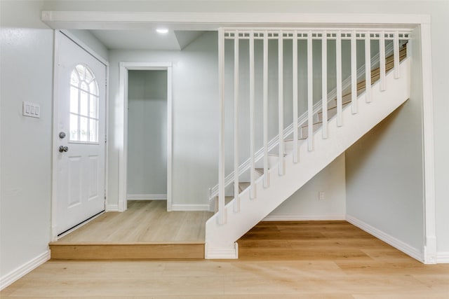 2018 Vail Dr, Garland, TX 75044 - entrance foyer with wood finished floors and stairway