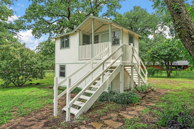 1813 Madera Dr, Waco, TX 76705 - back of property featuring stairway and a yard