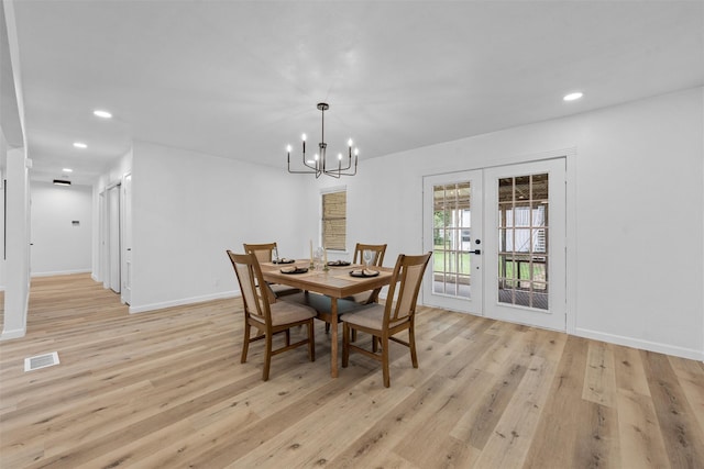 1813 Madera Dr, Waco, TX 76705 - dining room featuring french doors, a chandelier, light wood-style floors, and recessed lighting