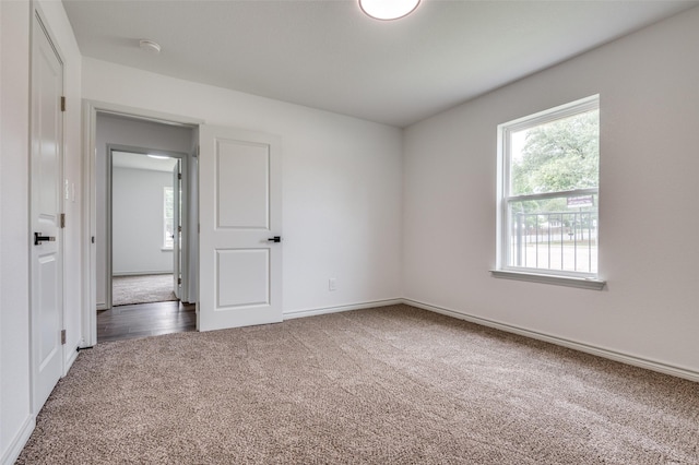2775 E Overton Rd, Dallas, TX 75216 - empty room featuring carpet floors and a smoke detector