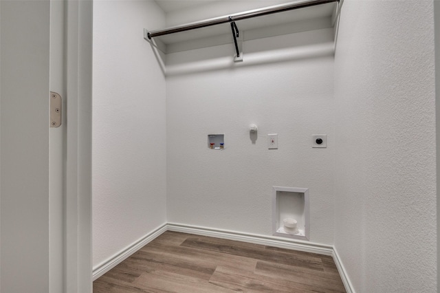 2775 E Overton Rd, Dallas, TX 75216 - laundry area featuring gas dryer hookup, hookup for an electric dryer, washer hookup, and wood finished floors