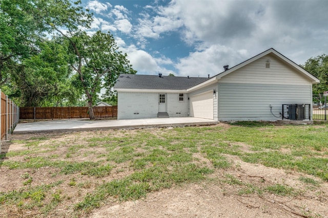 2775 E Overton Rd, Dallas, TX 75216 - back of property featuring a patio area, a fenced backyard, and a garage