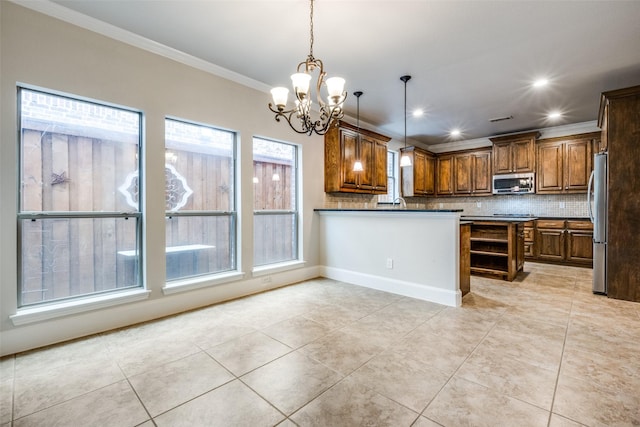 1909 Rocky Ct, Corinth, TX 76208 - kitchen with appliances with stainless steel finishes, a chandelier, decorative backsplash, crown molding, and light tile patterned flooring