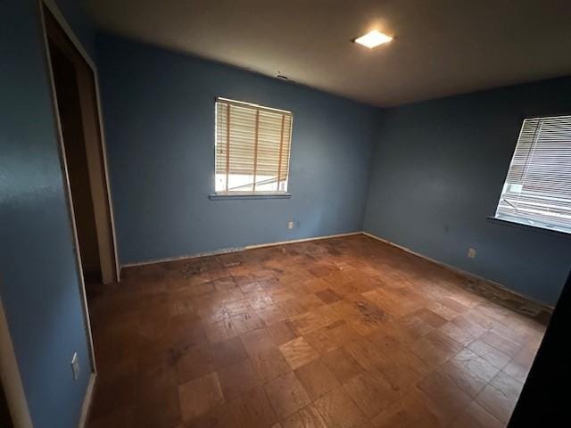 4973 Dupont Dr, Dallas, TX 75216 - unfurnished bedroom featuring baseboards