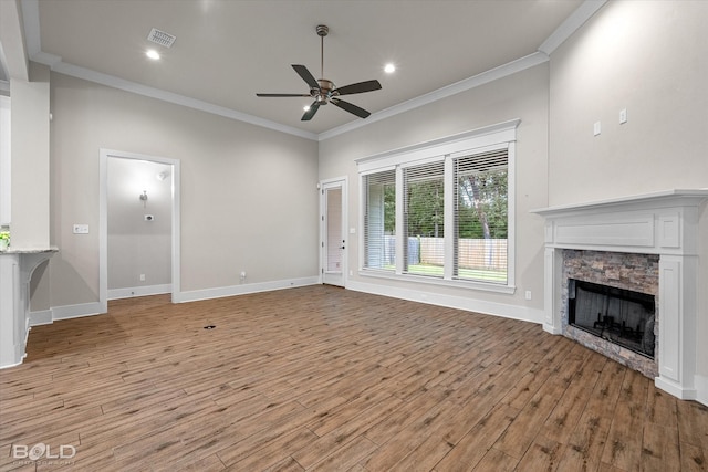 140 St Andrews Ln, Benton, LA 71006 - unfurnished living room with ceiling fan, ornamental molding, light wood-style floors, a fireplace, and recessed lighting