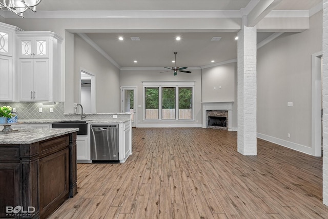140 St Andrews Ln, Benton, LA 71006 - kitchen featuring stainless steel dishwasher, a ceiling fan, ornamental molding, white cabinetry, and light wood-style floors