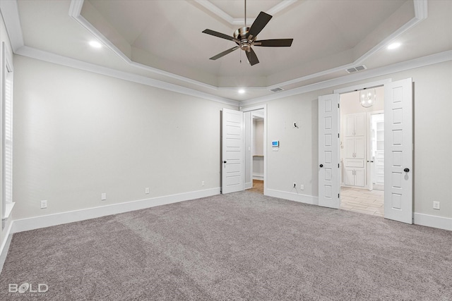140 St Andrews Ln, Benton, LA 71006 - unfurnished bedroom featuring a tray ceiling, carpet floors, recessed lighting, connected bathroom, and ornamental molding