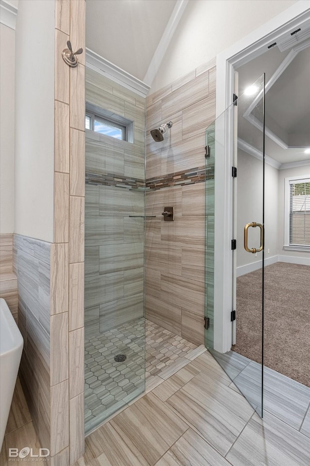 140 St Andrews Ln, Benton, LA 71006 - full bath featuring a shower stall, ornamental molding, vaulted ceiling, and a freestanding bath