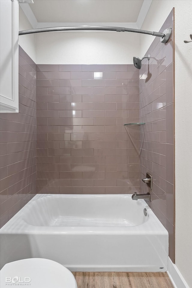140 St Andrews Ln, Benton, LA 71006 - full bathroom with wood finished floors and shower / bathtub combination