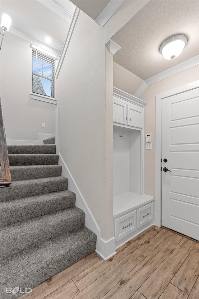 140 St Andrews Ln, Benton, LA 71006 - mudroom with light wood-style floors and crown molding
