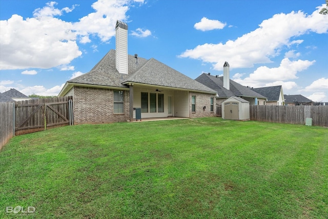140 St Andrews Ln, Benton, LA 71006 - rear view of property with a storage shed, a fenced backyard, brick siding, a chimney, and a patio area