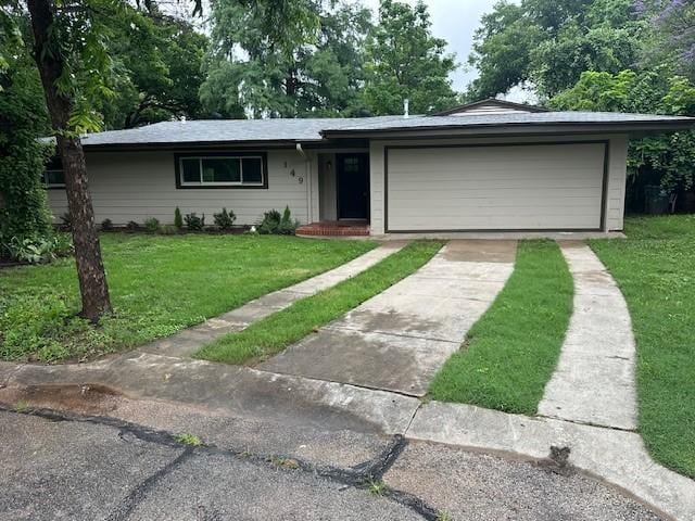 149 Parkwood Ave, Arlington, TX 76013 - ranch-style house with concrete driveway, a front yard, and a garage