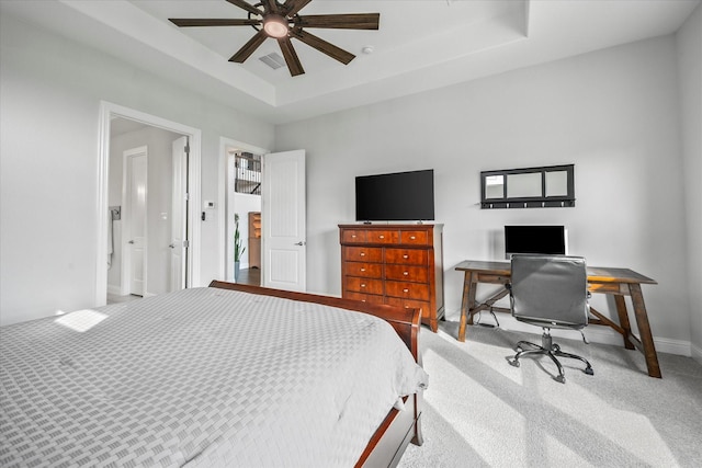 3005 Landmark Pl, Heath, TX 75126 - bedroom featuring a raised ceiling, carpet, a desk, and a ceiling fan